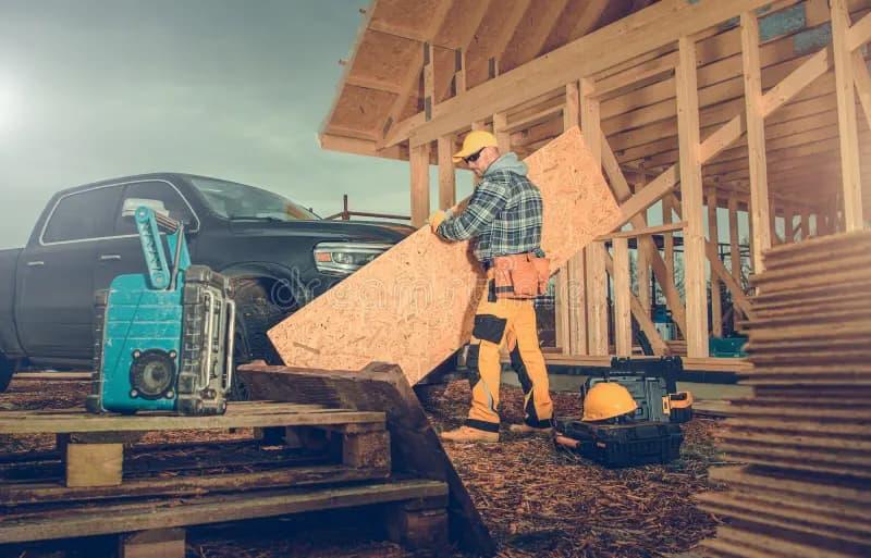 Building Worker Laying Bricks for Building a wall.